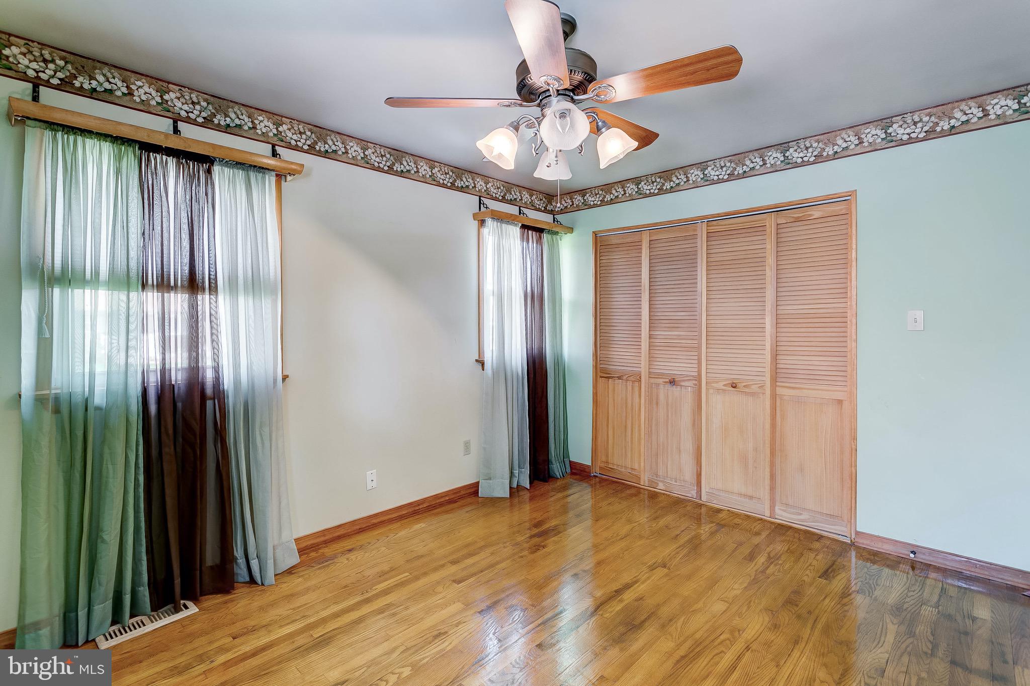 7709 Beekay Road Baltimore, MD 21219 - Photo 18 of 35 Wood Floors! Ceiling Fan!