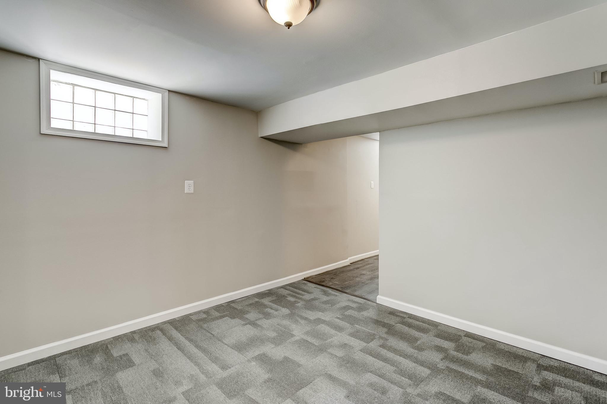 7709 Beekay Road Baltimore, MD 21219 - Photo 26 of 35 Partially Finished Basement!