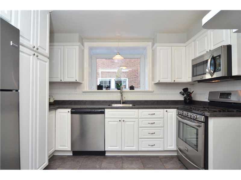 354 Midway Road Mt. Lebanon, PA 15216 - Photo 7 of 24 Kitchen. Cheerful white kitchen with greenhouse window, stainless steel appliances and ceramic tile flooring.