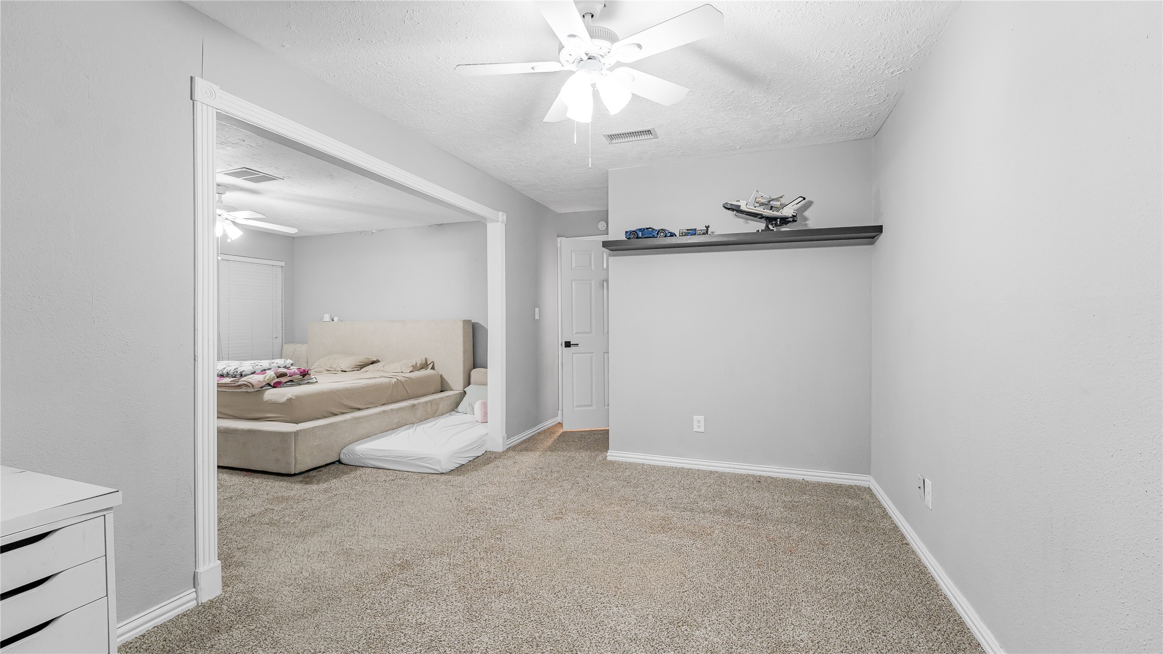23010 Grand Rapids Lane Spring, TX 77373 - Photo 4 of 9 an entryway and a chandelier fan in a room
