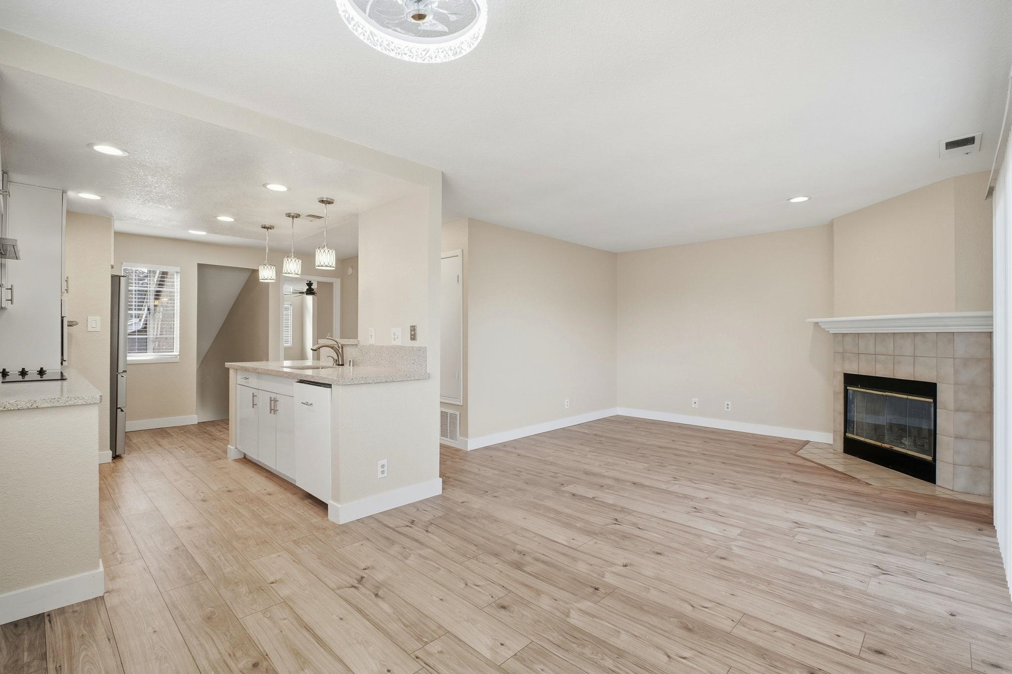 58 Trestle Drive Hayward, CA 94544 - Photo 6 of 36 a view of kitchen and hall with wooden floor