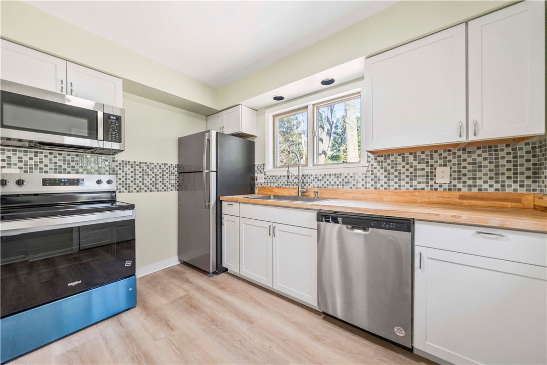 321 Eaglehead Road Perinton, NY 14445 - Photo 26 of 48 Secondary unit kitchen with new appliances