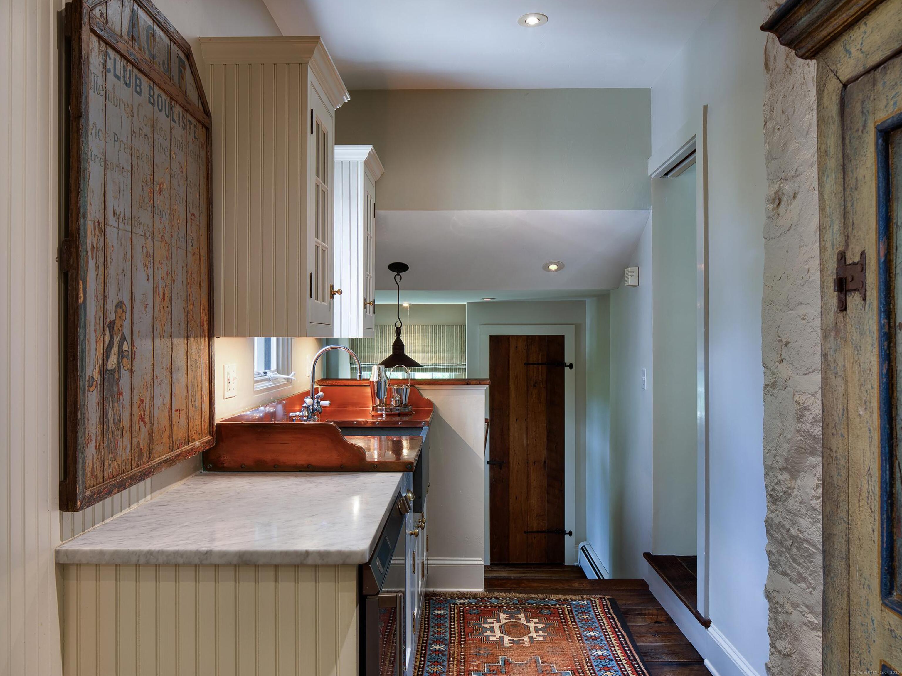 213 Beaver Brook Road Lyme, CT 06371 - Photo 14 of 38 Kitchen Hallway and Wet Bar