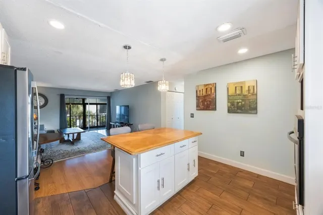 a living room with furniture rug and window