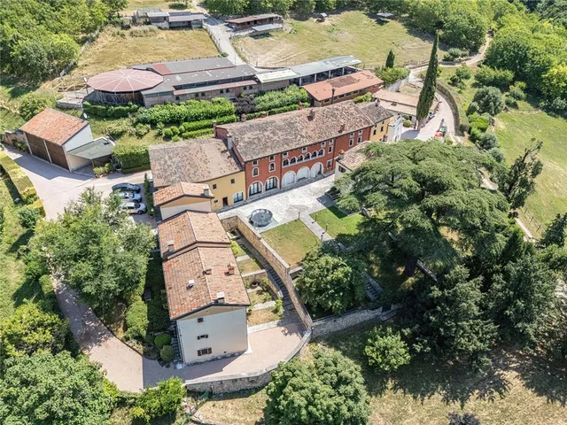 an aerial view of house with yard