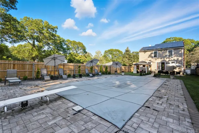 a garden view with a seating space