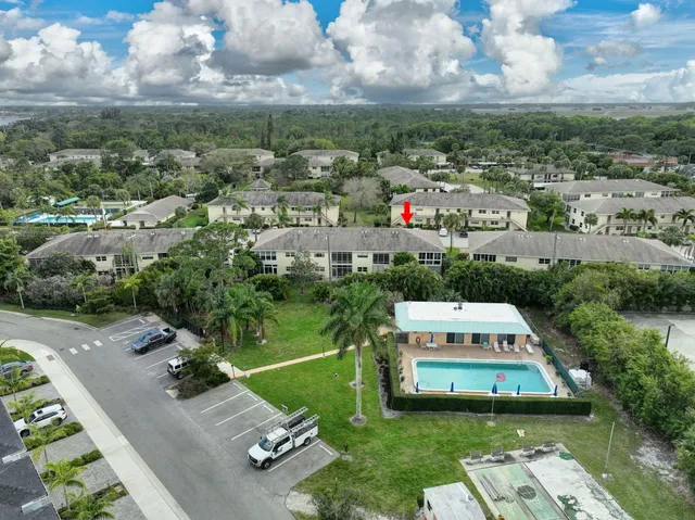 an aerial view of a house with a garden