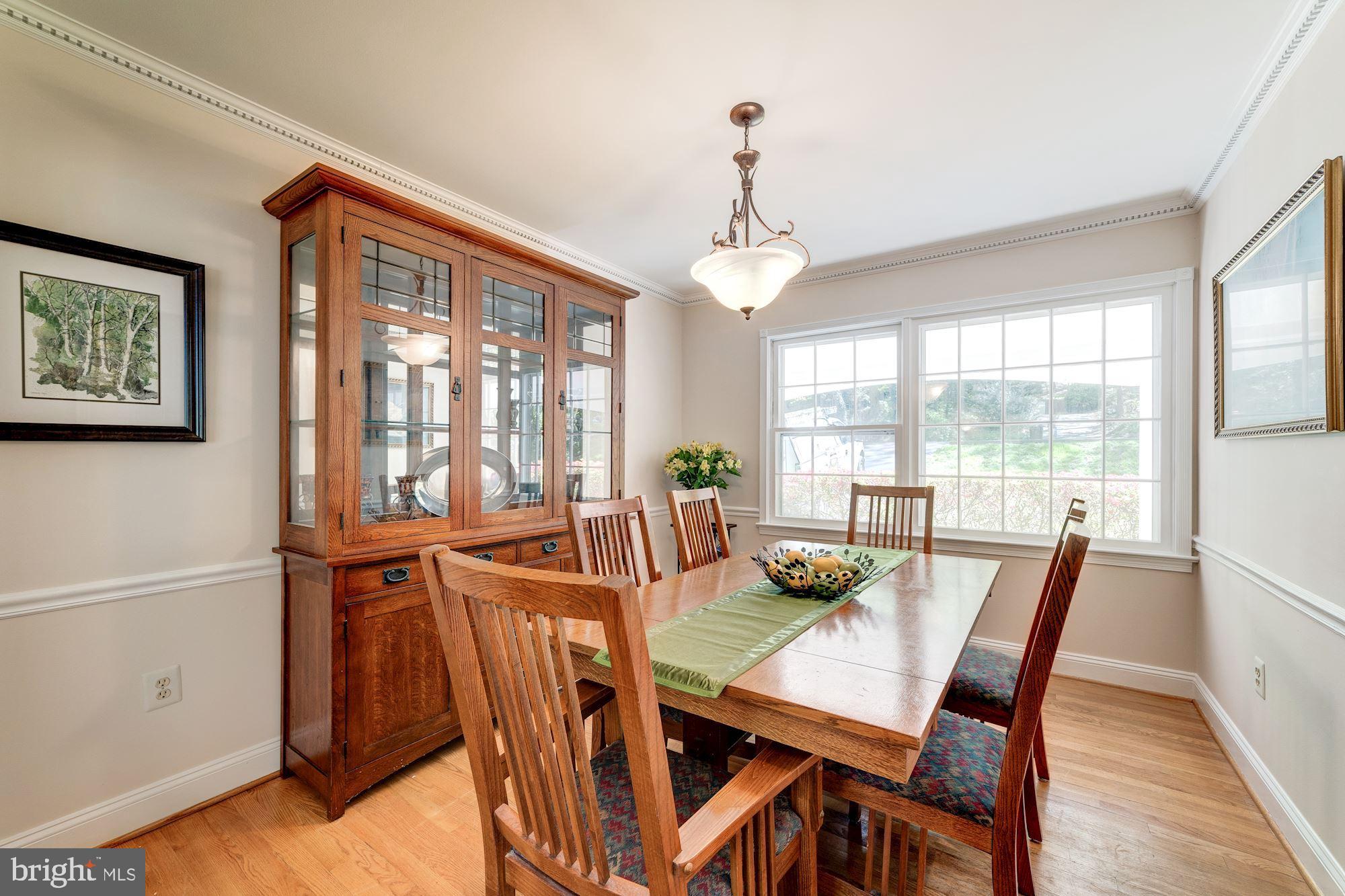 11310 Myrtle Lane Reston, VA 20191 - Photo 13 of 42 a view of a dining room with furniture window and outside view