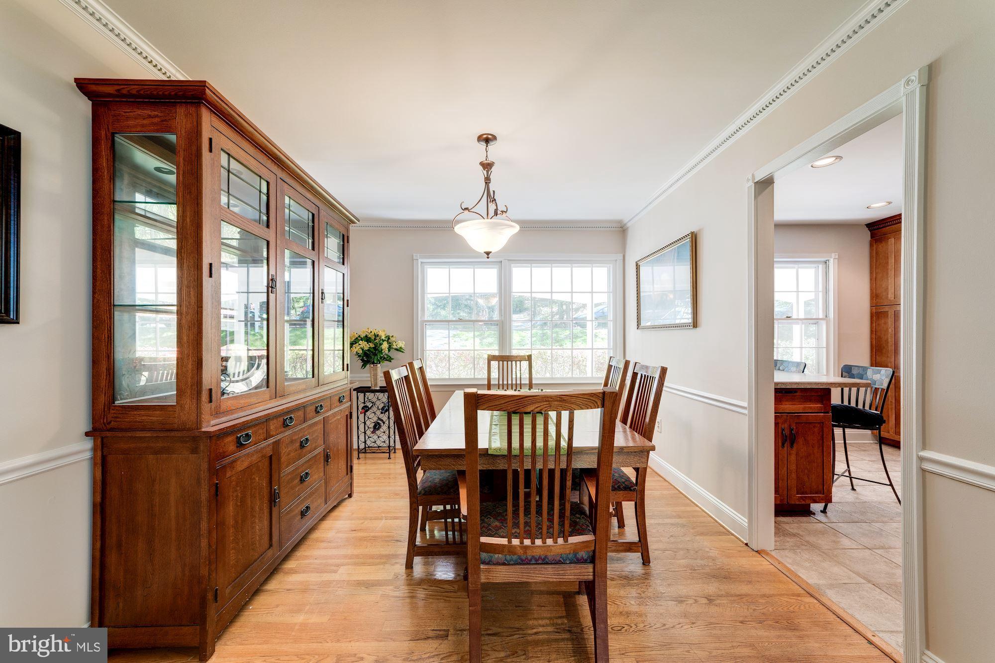 11310 Myrtle Lane Reston, VA 20191 - Photo 15 of 42 a view of a dining room with furniture window and outside view
