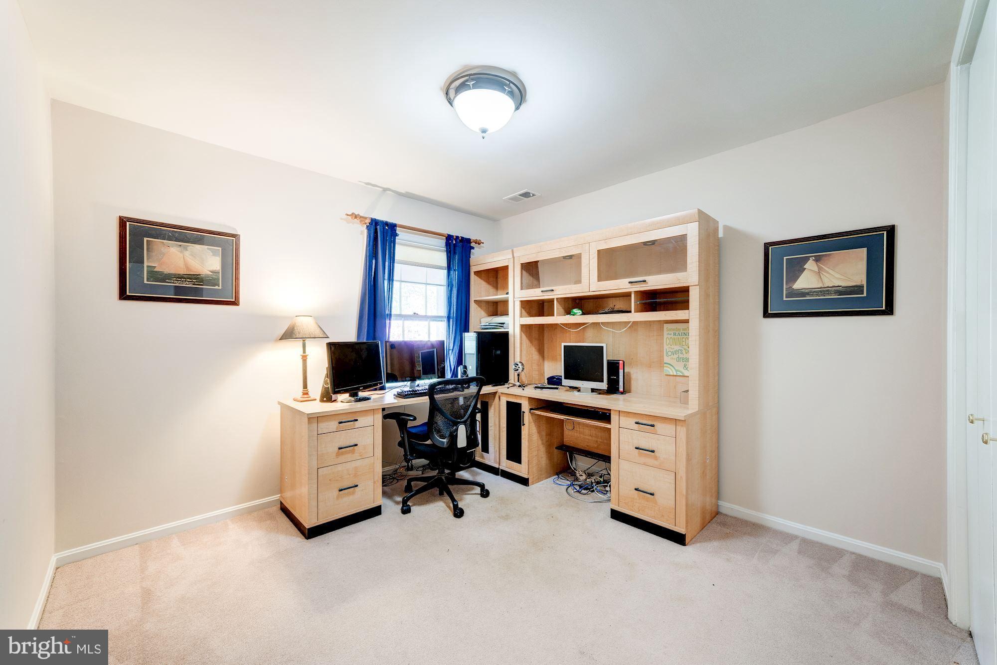 11310 Myrtle Lane Reston, VA 20191 - Photo 25 of 42 a view of a workspace with a window