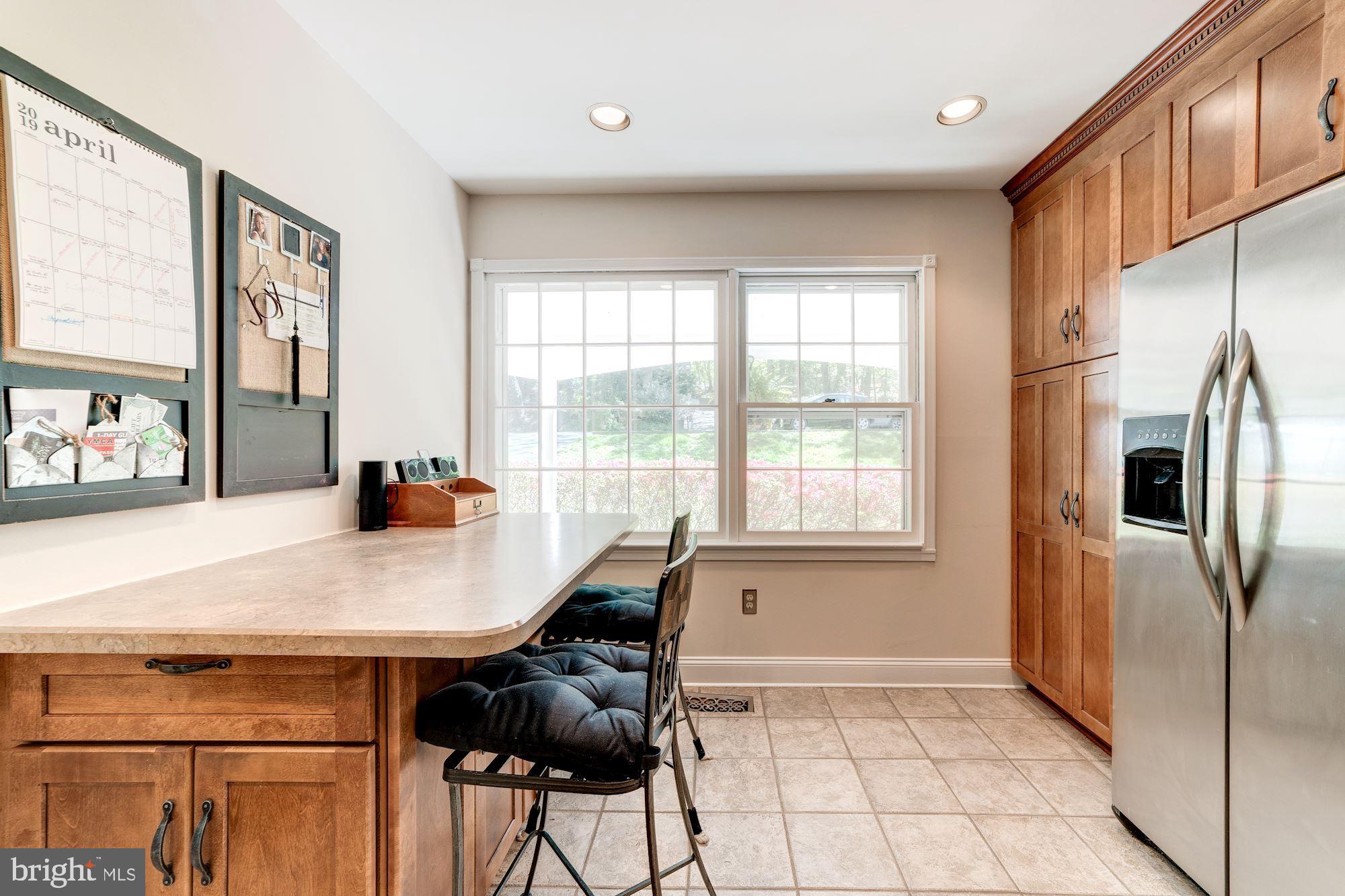 11310 Myrtle Lane Reston, VA 20191 - Photo 9 of 42 a view of a kitchen with furniture and window