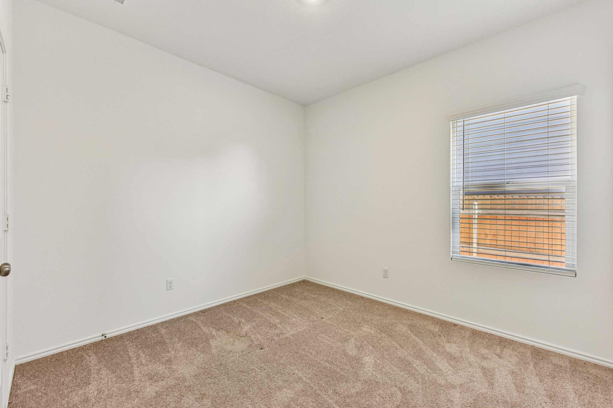 312 The Bad Way Jarrell, TX 76537 - Photo 15 of 38 an empty room with a window
