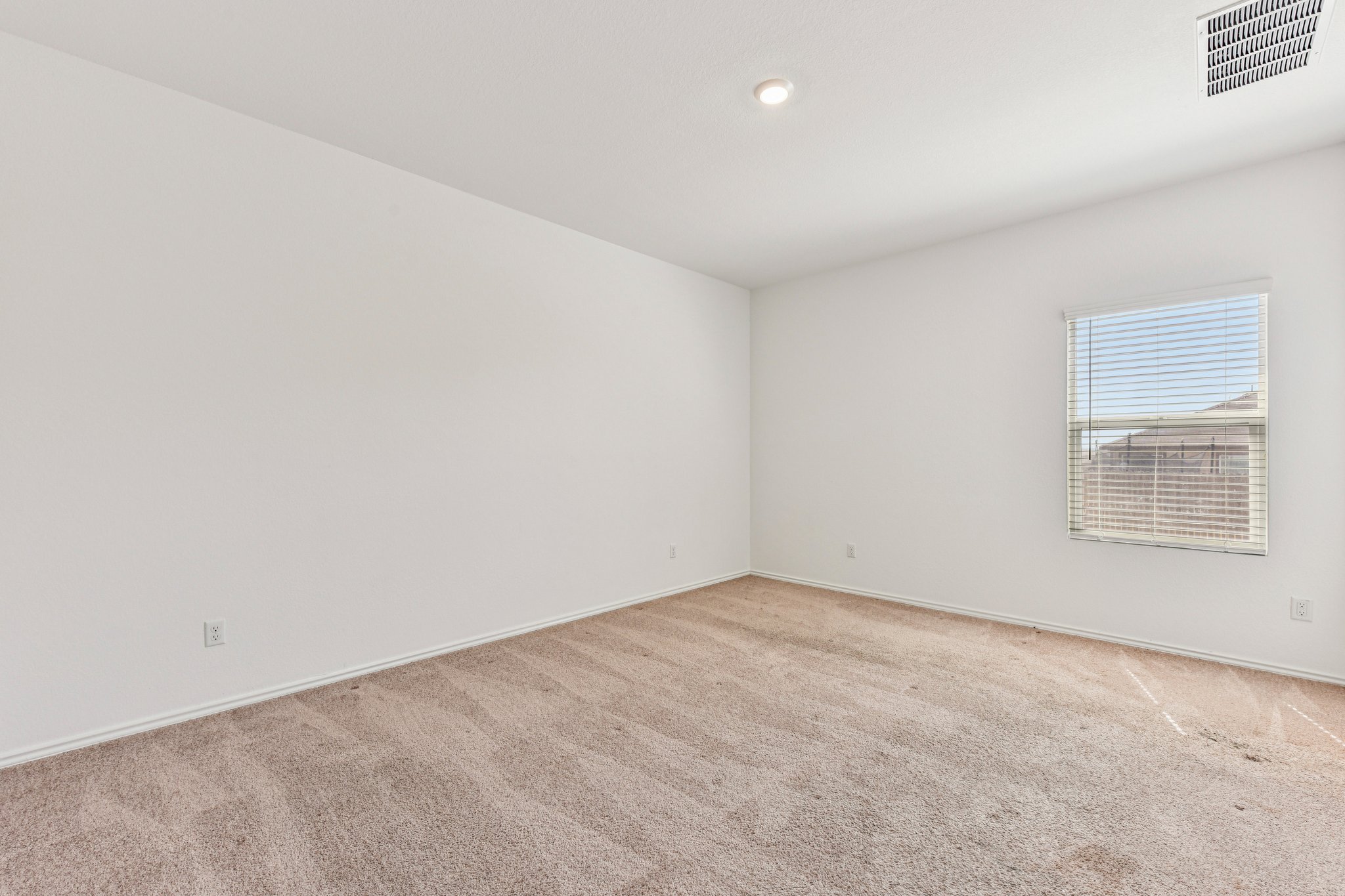 312 The Bad Way Jarrell, TX 76537 - Photo 21 of 38 an empty room with a window