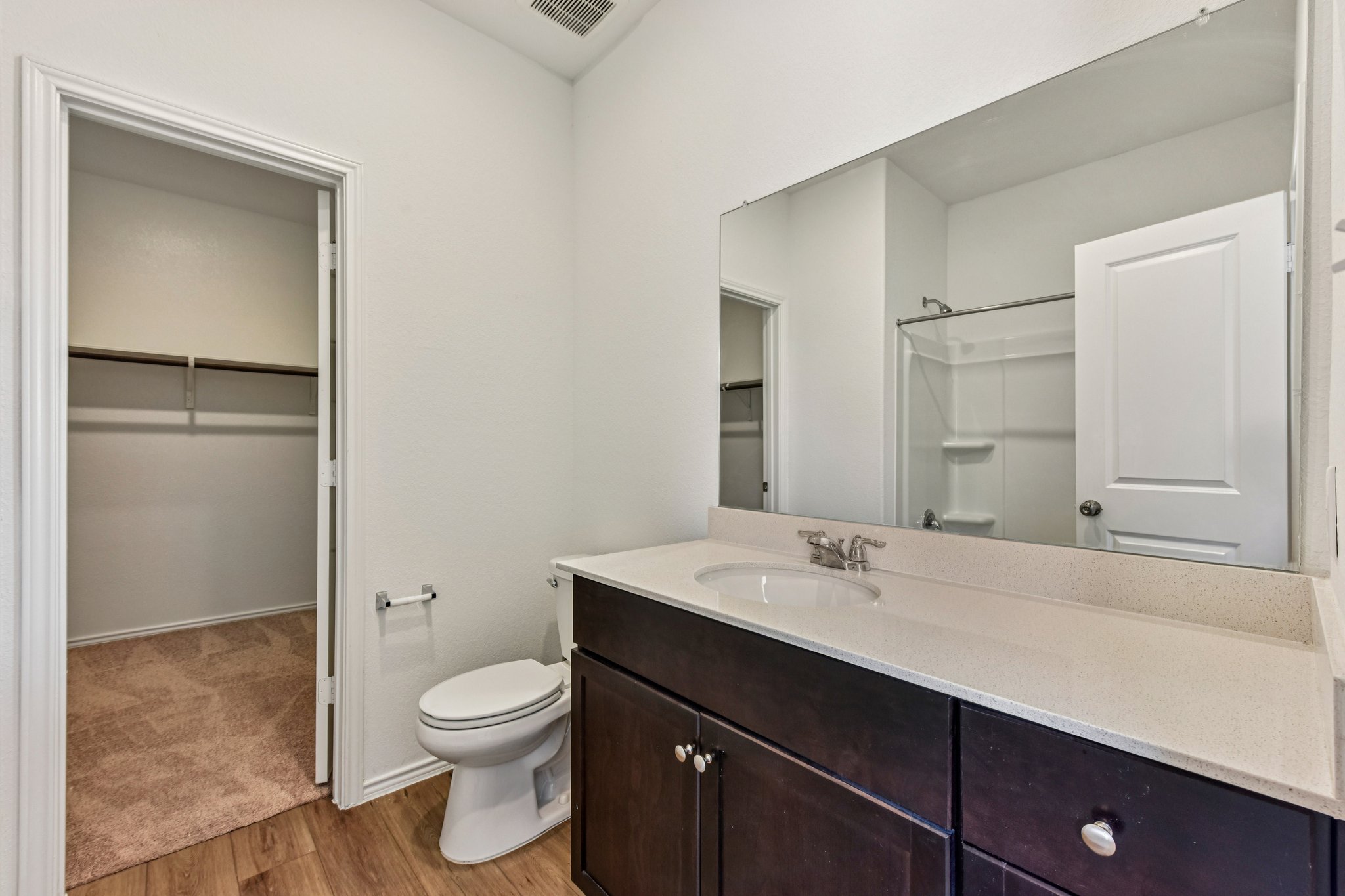 312 The Bad Way Jarrell, TX 76537 - Photo 25 of 38 a bathroom with a sink a toilet and shower