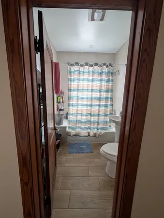 a bathroom with a sink and toilet