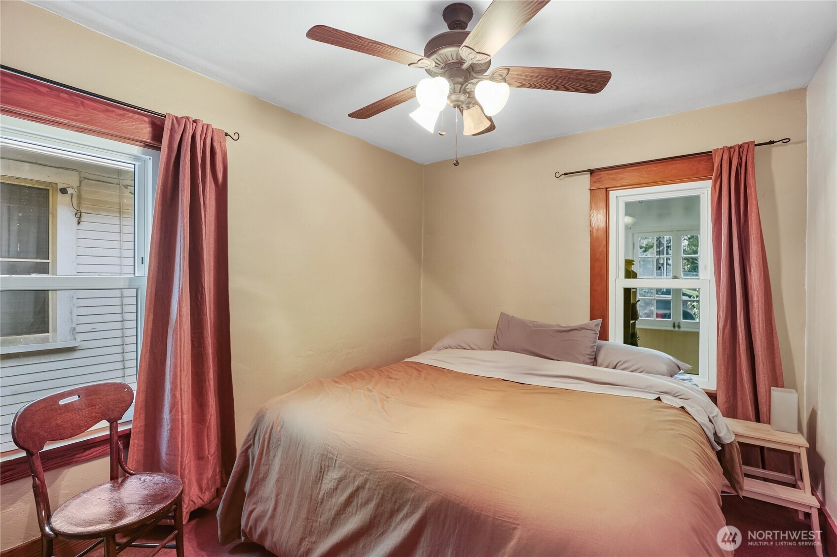 1939 Gregory Way Bremerton, WA 98337 - Photo 13 of 36 a bedroom with a bed and a chandelier