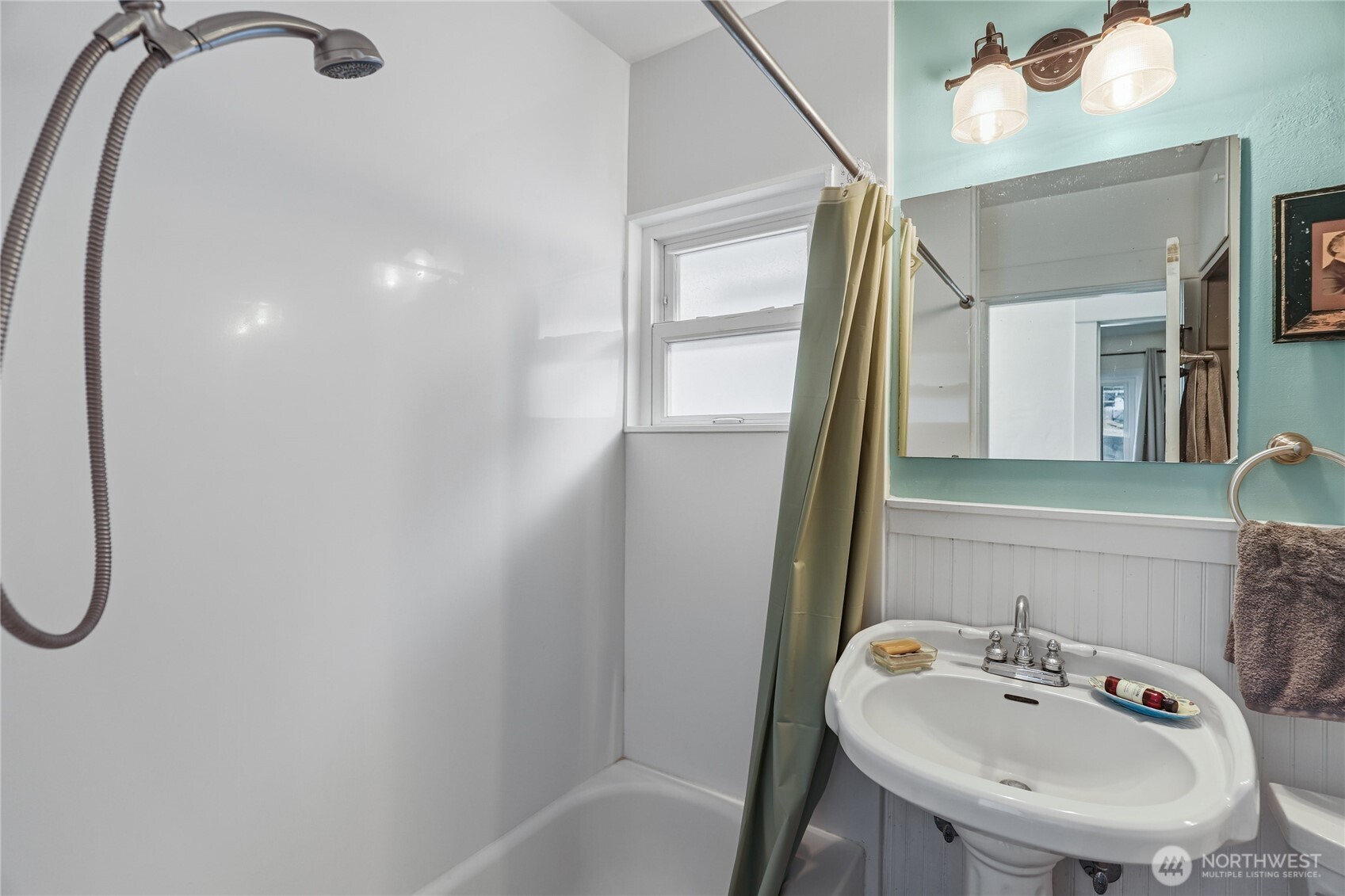 1939 Gregory Way Bremerton, WA 98337 - Photo 15 of 36 a bathroom with a sink and a mirror