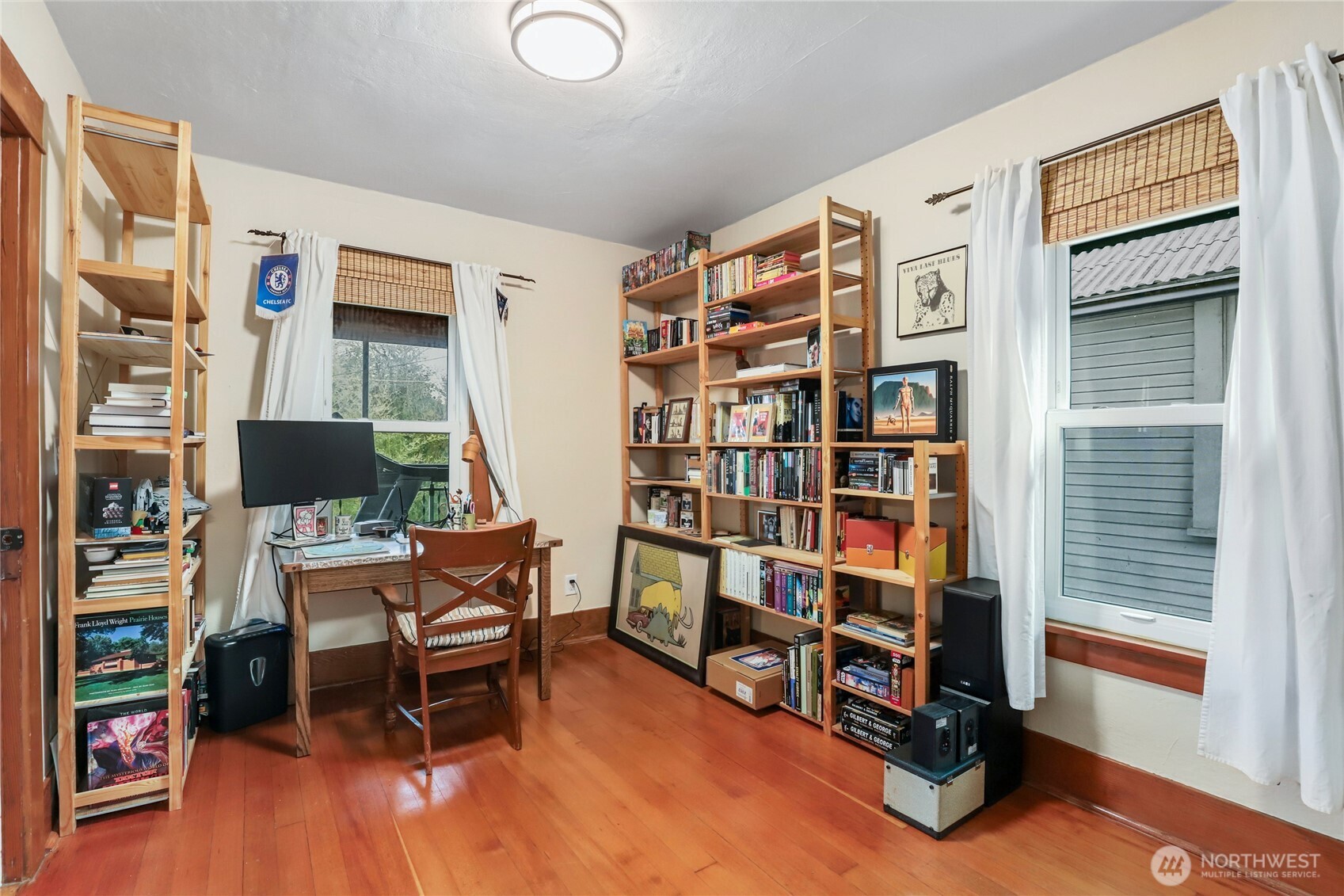 1939 Gregory Way Bremerton, WA 98337 - Photo 16 of 36 a room with furniture and a book shelf