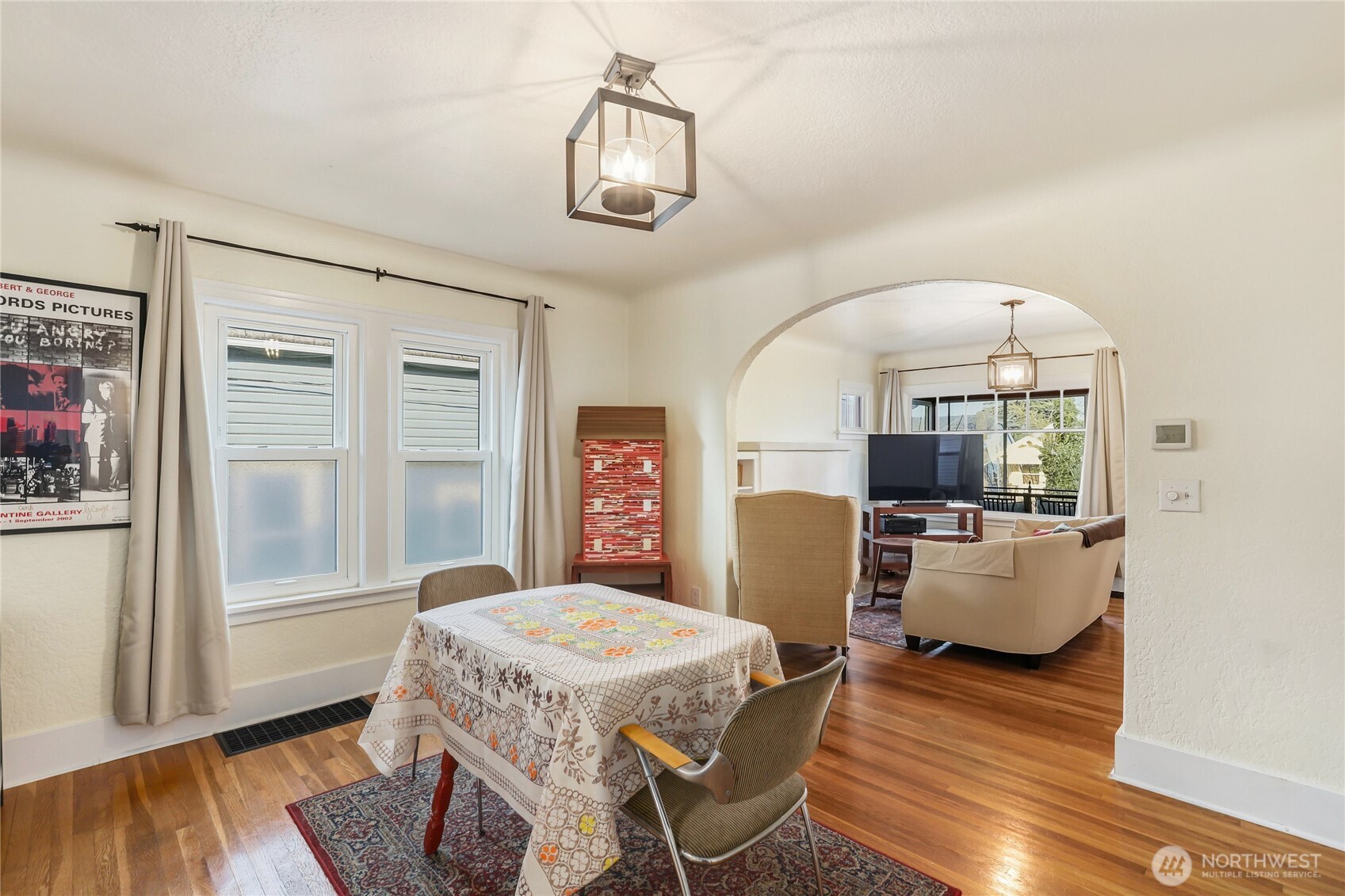 1939 Gregory Way Bremerton, WA 98337 - Photo 8 of 36 a view of a dining room with furniture window and wooden floor