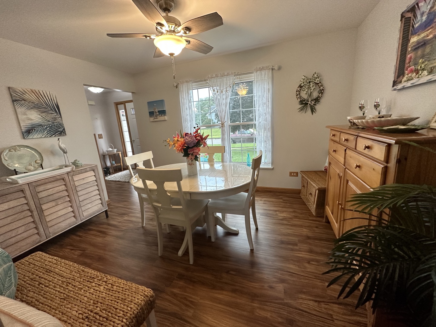 308 Glenbrook Trail McHenry, IL 60050 - Photo 12 of 29 a view of a dining room with furniture window and wooden floor