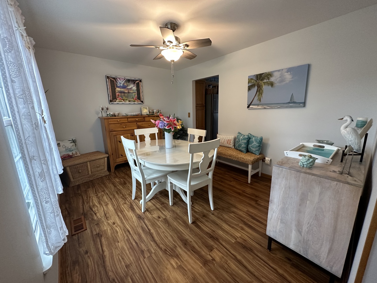 308 Glenbrook Trail McHenry, IL 60050 - Photo 13 of 29 a dining room with furniture a chandelier and wooden floor