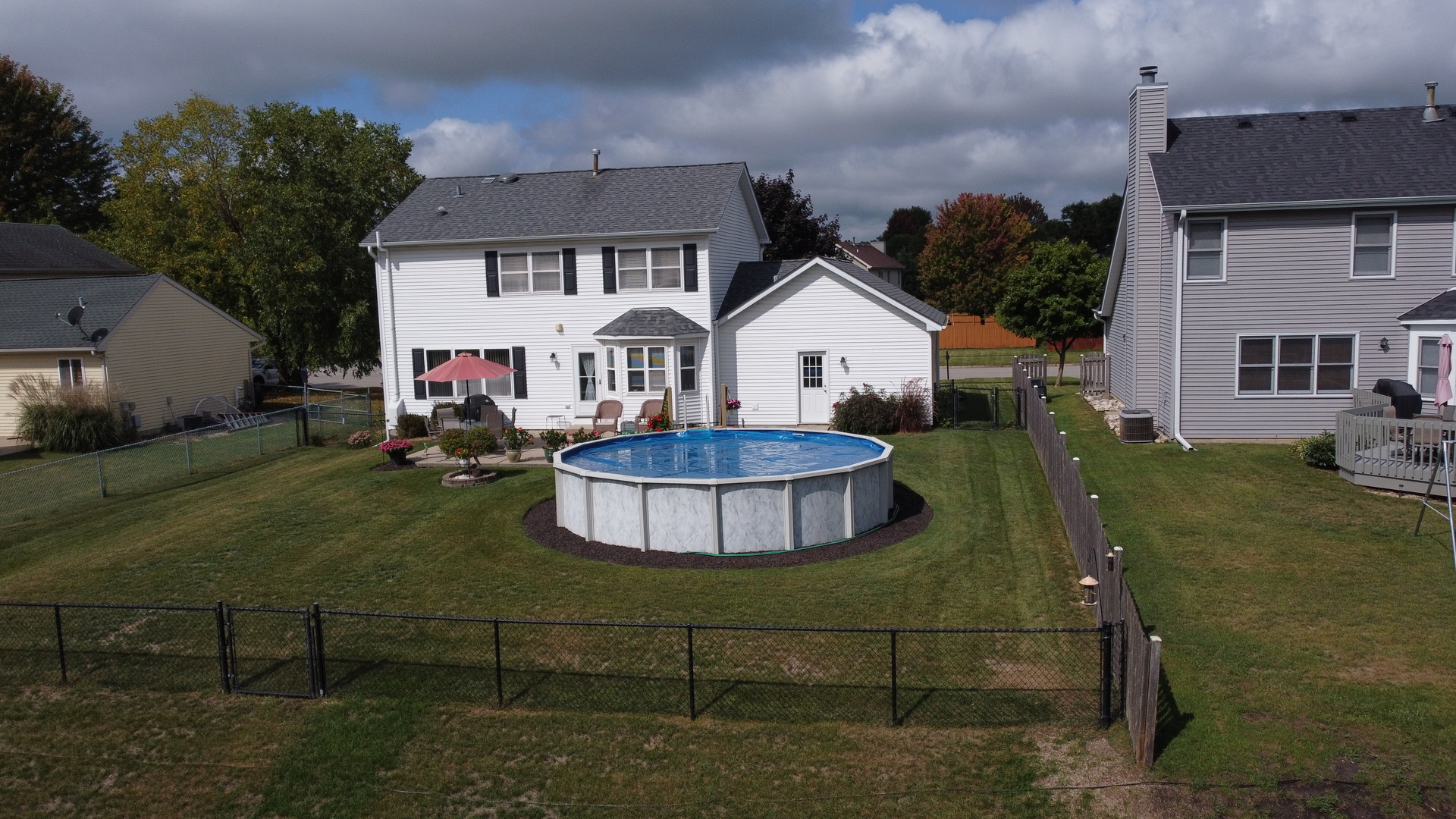 308 Glenbrook Trail McHenry, IL 60050 - Photo 24 of 29 a front view of a house with a yard