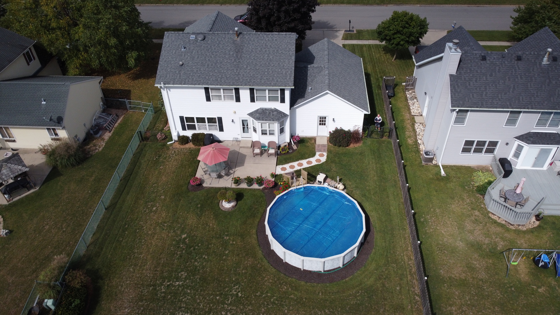 308 Glenbrook Trail McHenry, IL 60050 - Photo 4 of 29 an aerial view of a house with swimming pool and glass doors