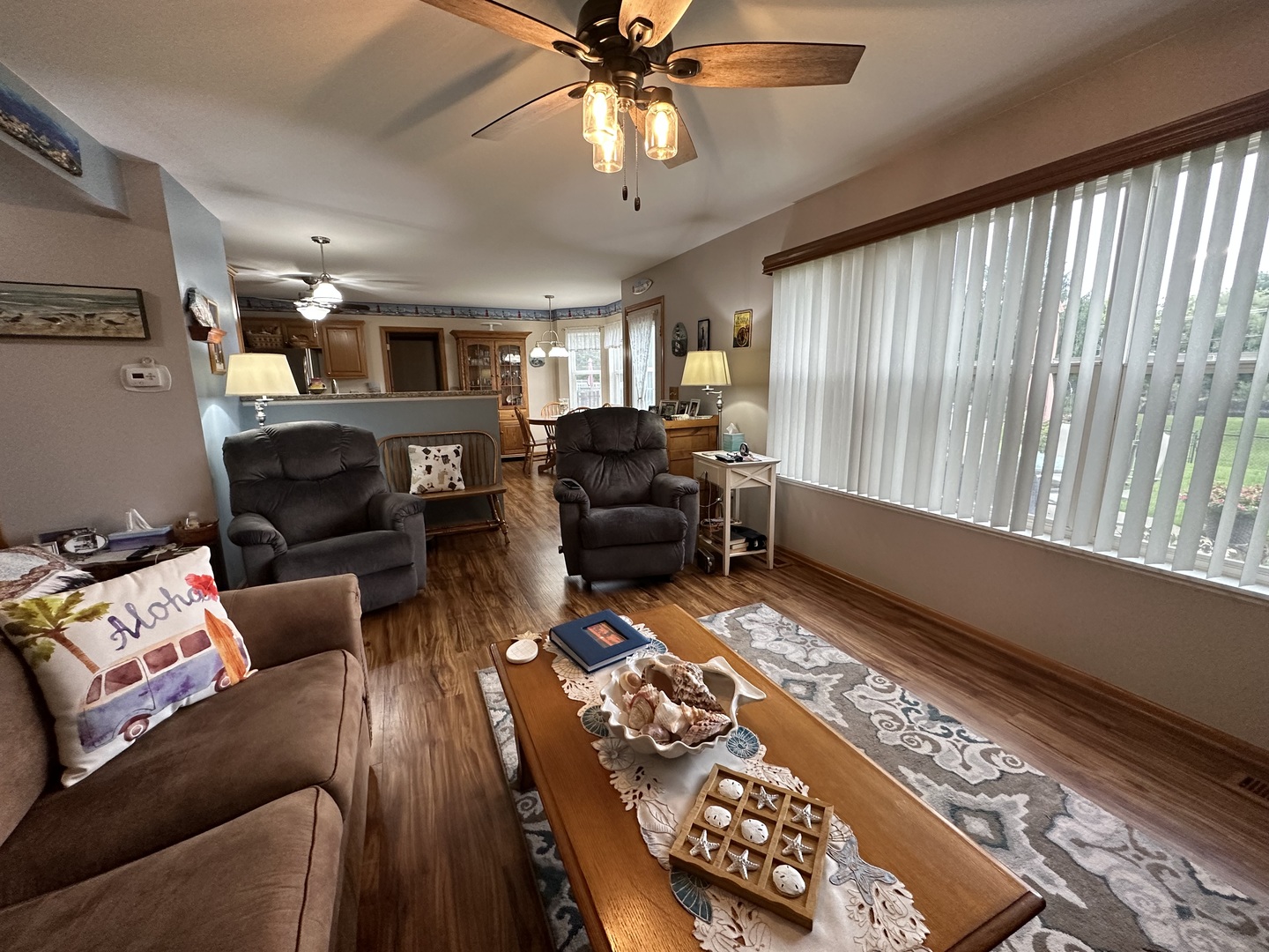 308 Glenbrook Trail McHenry, IL 60050 - Photo 9 of 29 a living room with furniture and a large window