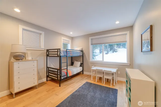 a bedroom with furniture and window