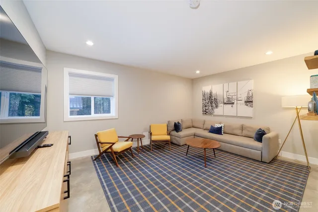 a living room with furniture and a couch