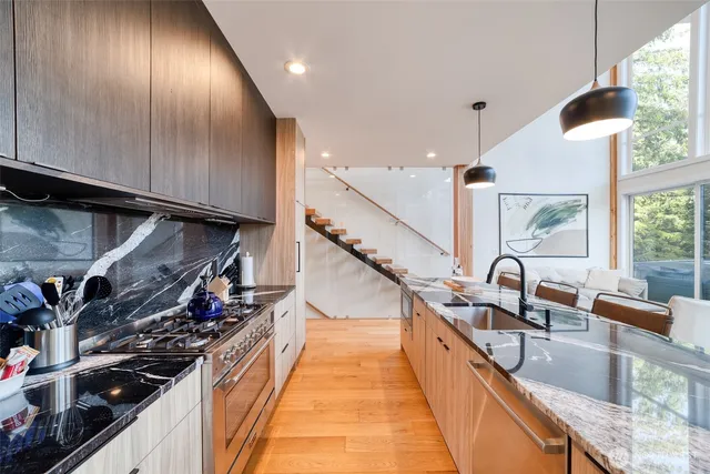 a kitchen with kitchen island granite countertop lots of counter top space