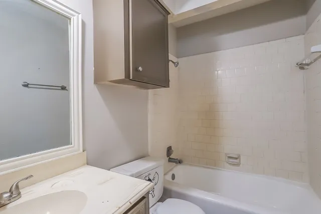 a bathroom with a sink and a bathtub