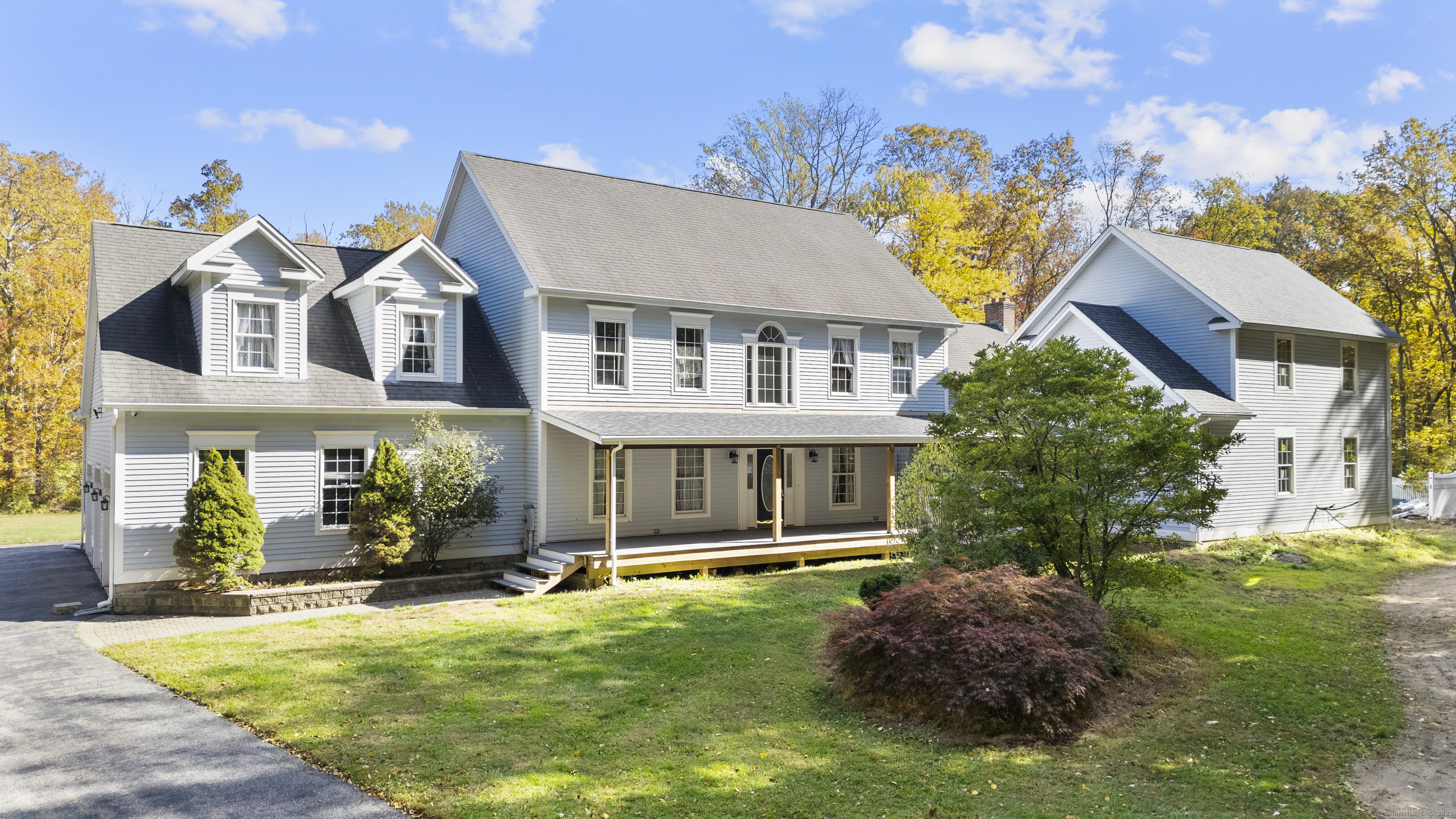 a front view of a house with swimming pool