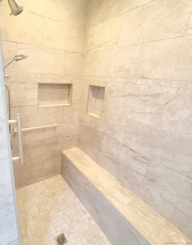 a bathroom with a bathtub