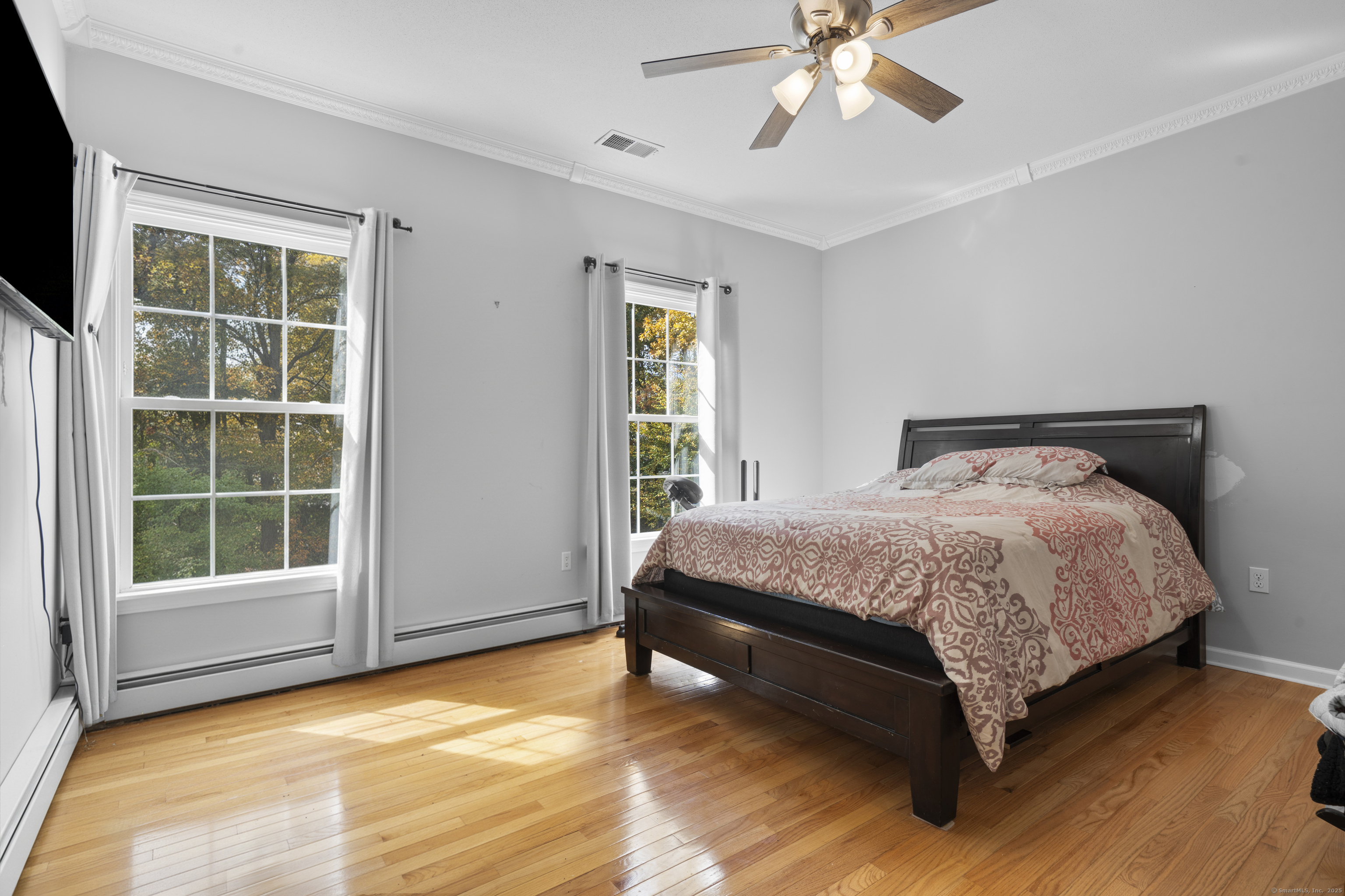 63 Taylor Road Colchester, CT 06415 - Photo 19 of 40 a bedroom with a bed and window