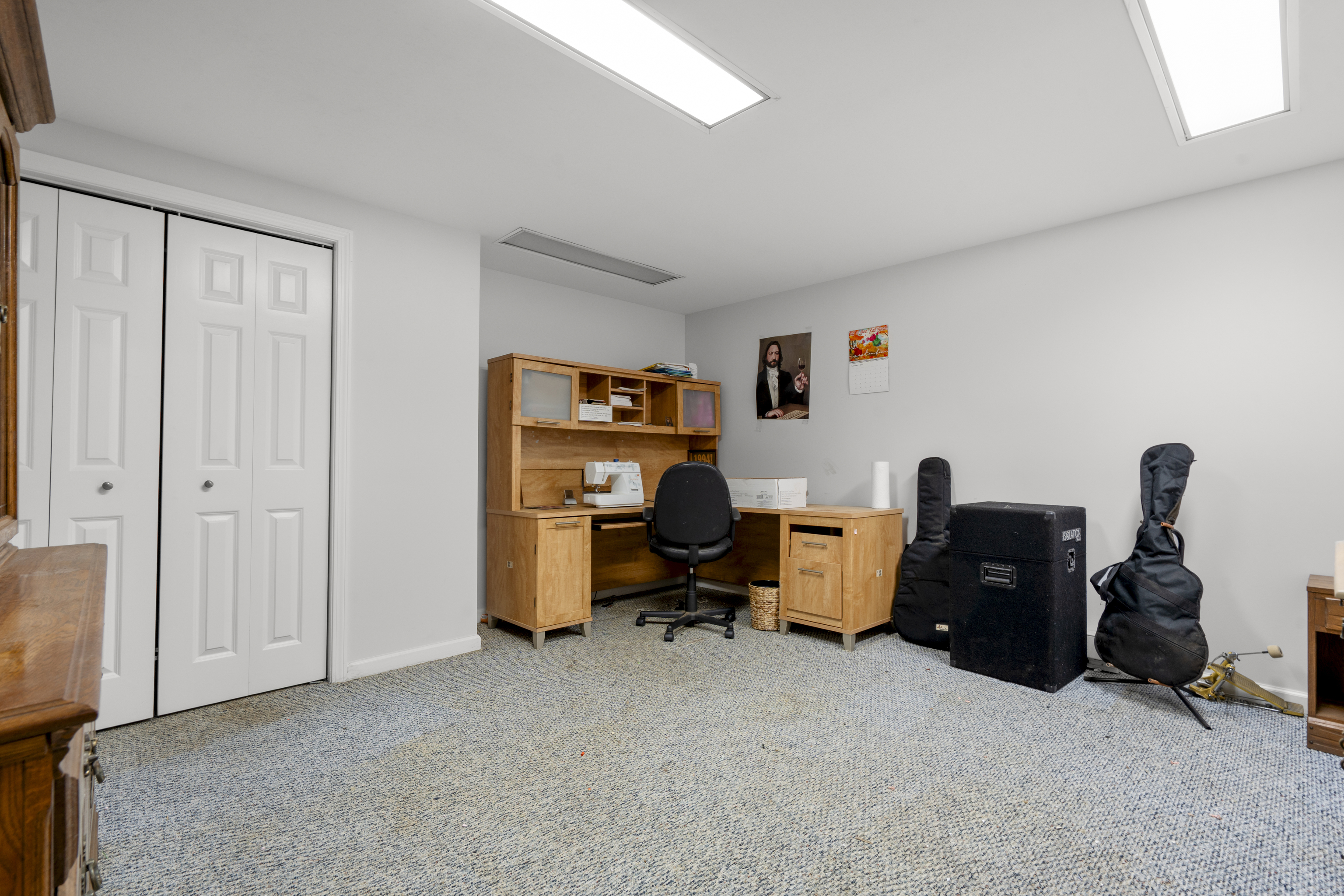 63 Taylor Road Colchester, CT 06415 - Photo 28 of 40 a view of a workspace with furniture and a window