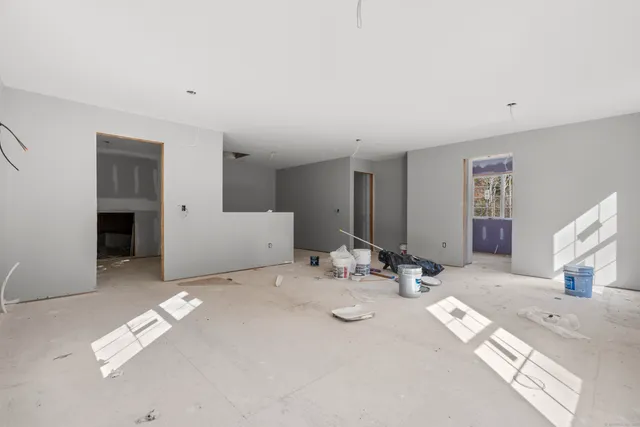 a view of a livingroom with furniture and window