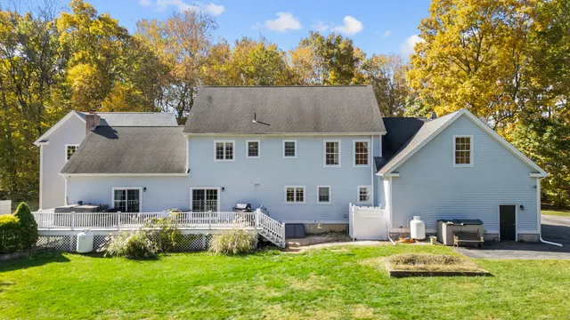 a house that has a big yard in front of it