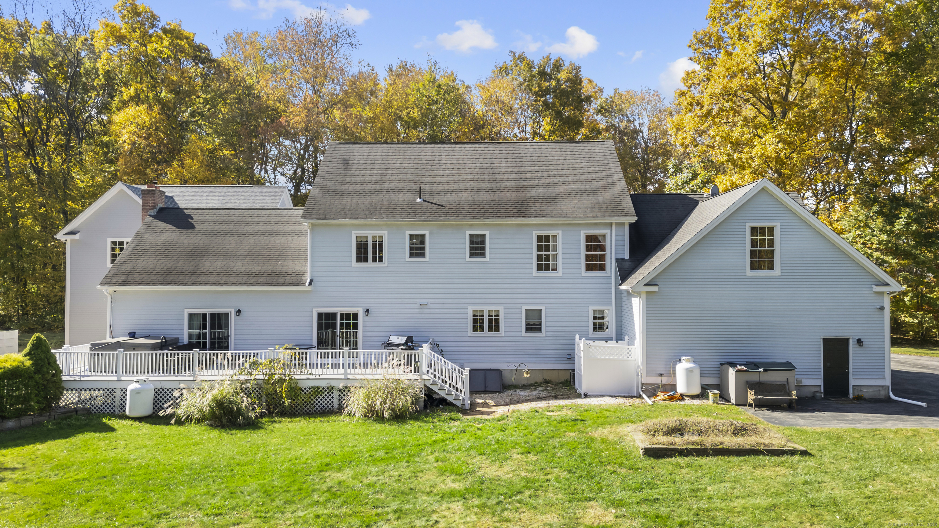 63 Taylor Road Colchester, CT 06415 - Photo 37 of 40 a house that has a big yard in front of it