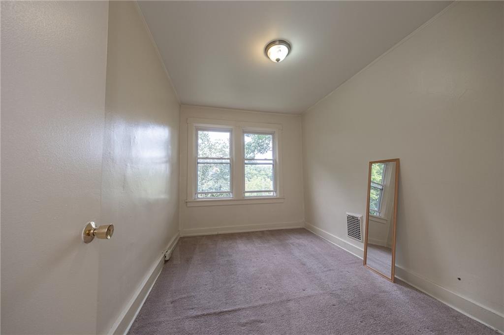 7315 Whipple Street Pittsburgh, PA 15218 - Photo 12 of 24 an empty room with windows