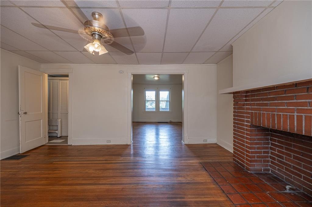 7315 Whipple Street Pittsburgh, PA 15218 - Photo 3 of 24 wooden floor in an empty room with a window