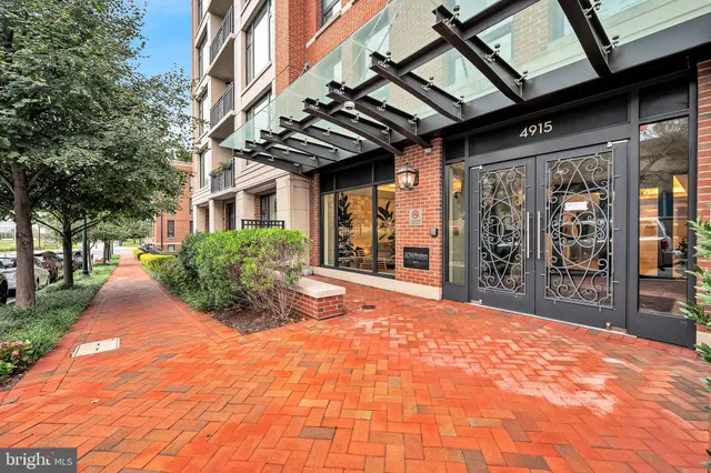 a view of swimming pool with outdoor seating