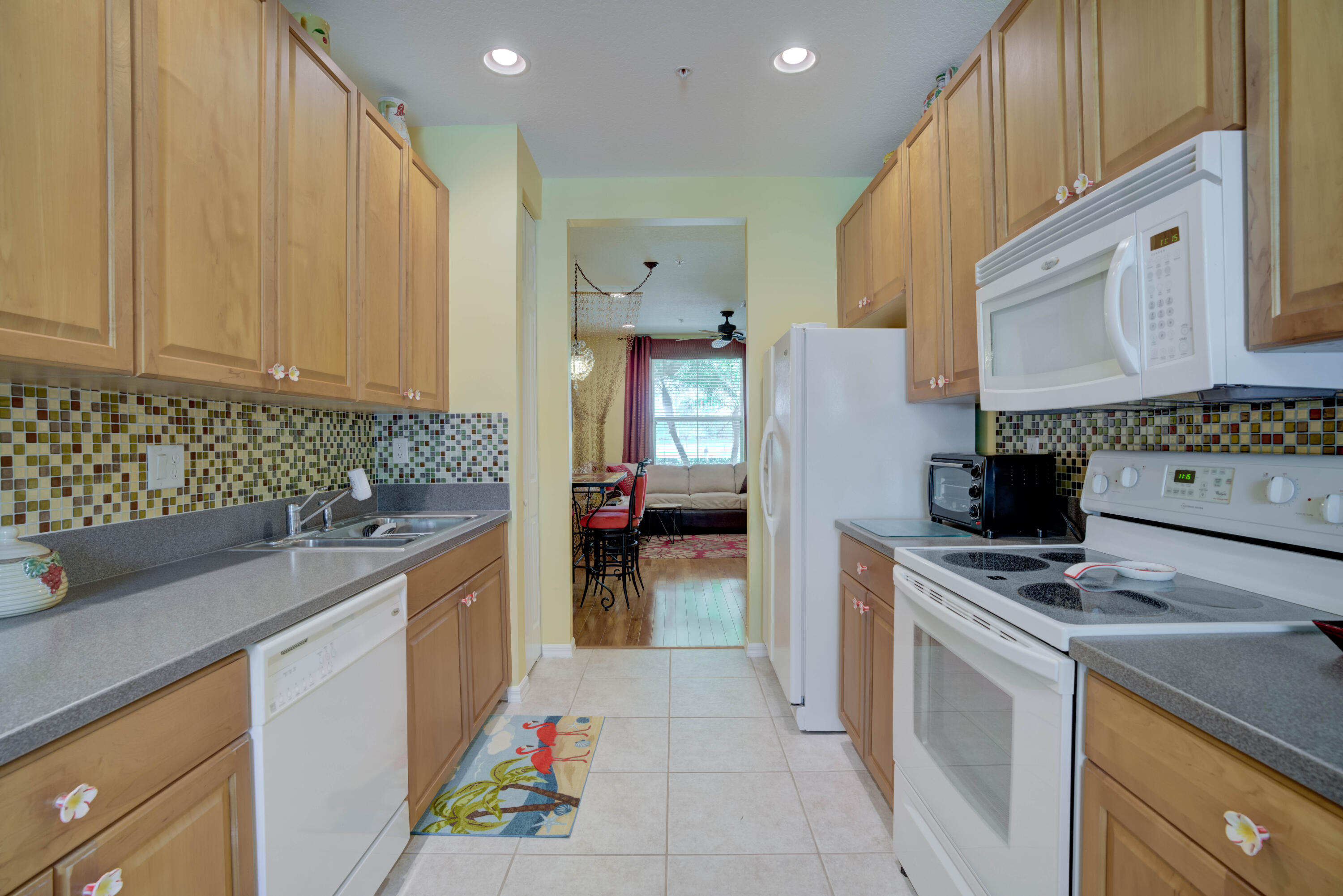 4166 Stadium Drive Jupiter, FL 33458 - Photo 6 of 36 4166 Stadium Kitchen Area to Livimg room