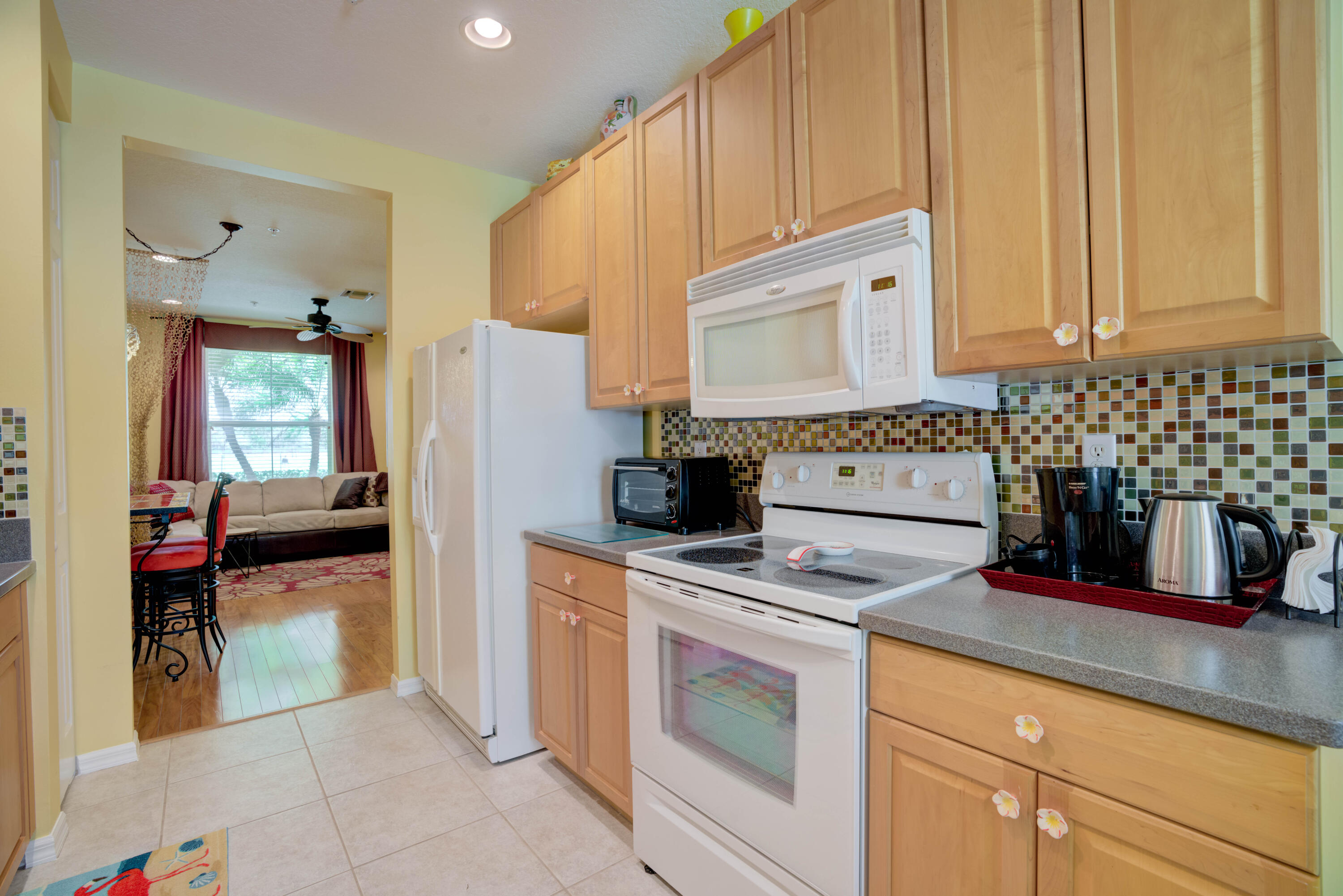 4166 Stadium Drive Jupiter, FL 33458 - Photo 7 of 36 4166 Stadium Kitchen Area to Living room