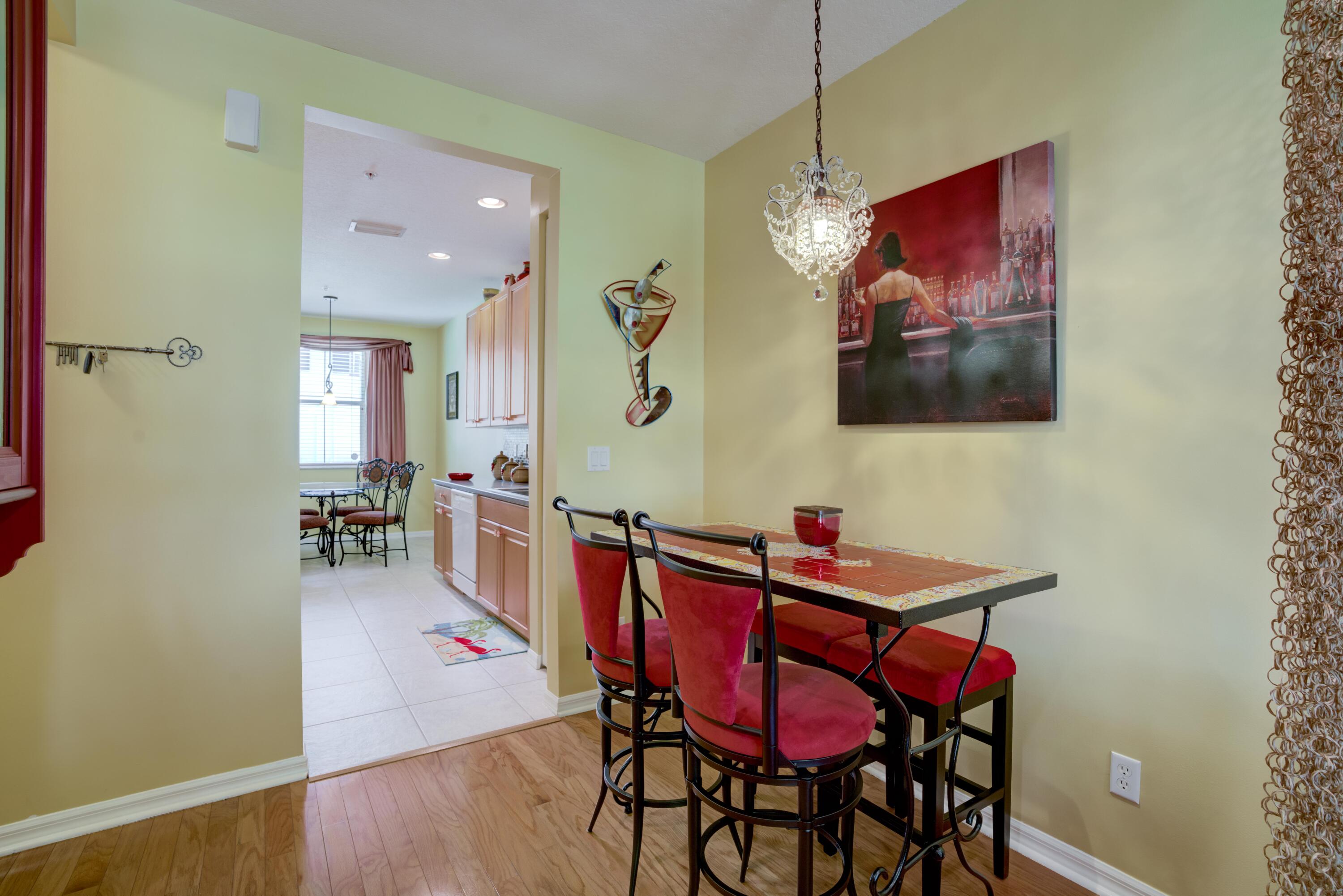 4166 Stadium Drive Jupiter, FL 33458 - Photo 10 of 36 4166 Stadium Dining and Kitchen Areas