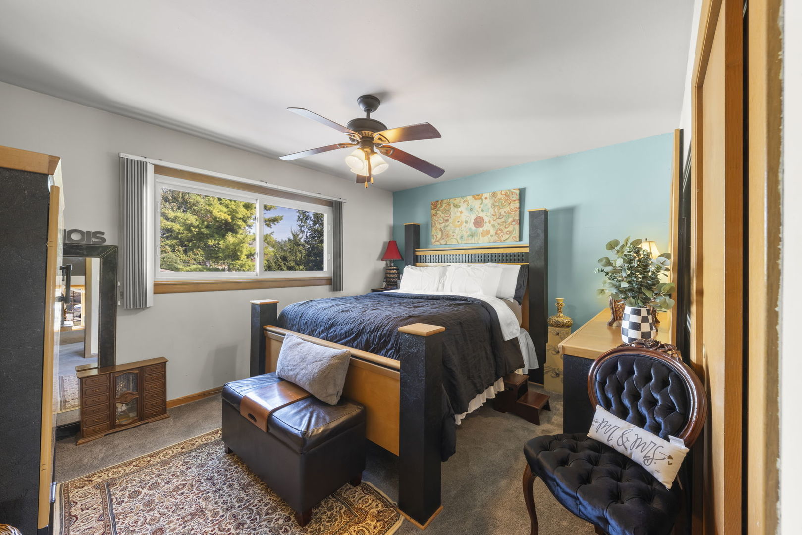 5628 Hawthorne Avenue Berkeley, IL 60163 - Photo 11 of 18 a bedroom with a bed and a couch