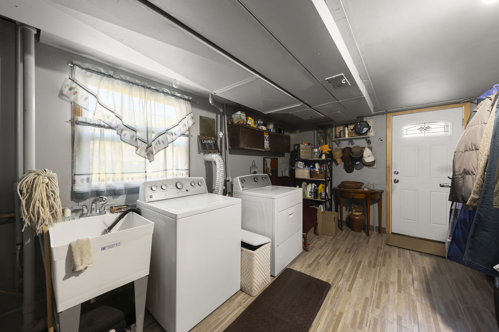 5628 Hawthorne Avenue Berkeley, IL 60163 - Photo 16 of 18 a view of a storage & utility room with washer and dryer