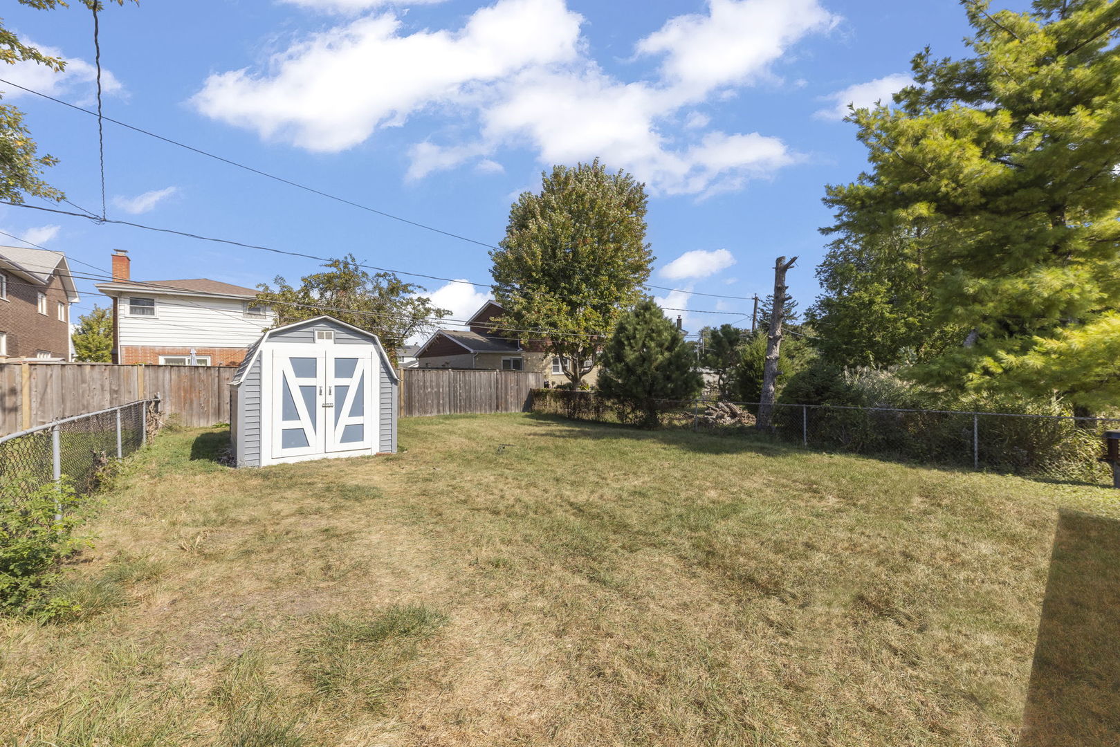 5628 Hawthorne Avenue Berkeley, IL 60163 - Photo 18 of 18 a view of a house with a yard