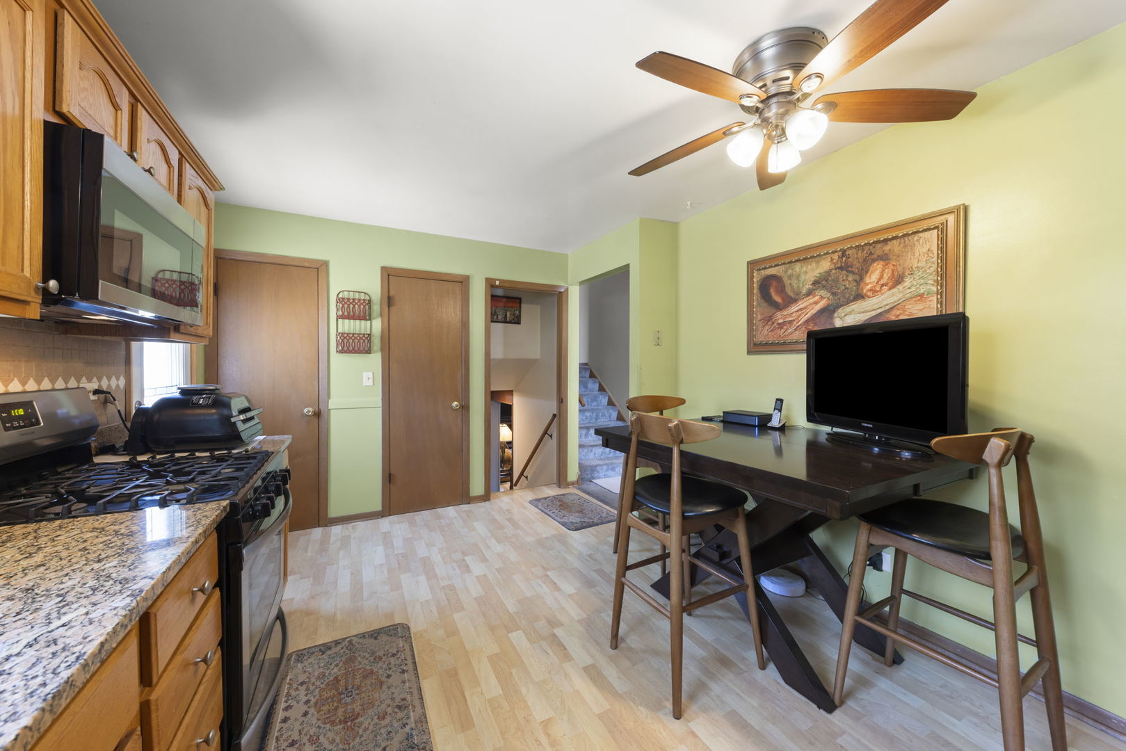 5628 Hawthorne Avenue Berkeley, IL 60163 - Photo 8 of 18 a view of a workspace with furniture