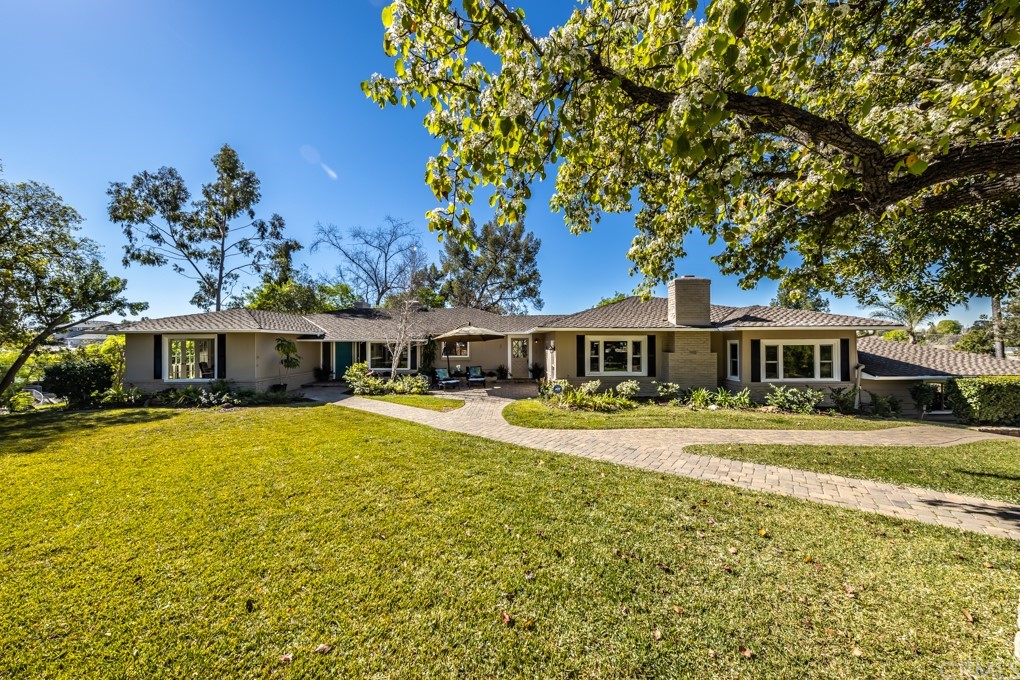 View of the front of the home with the front door facing the east.